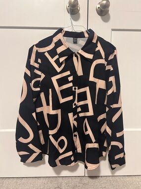 Black Button-Up Blouse with Beige Graphic Lettering